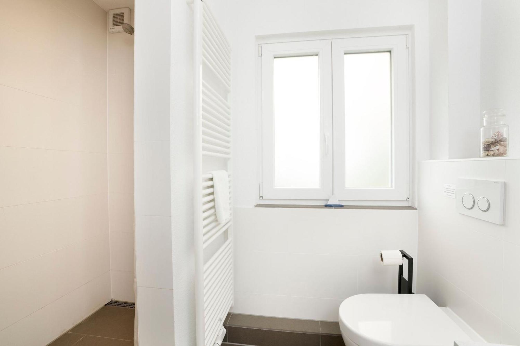 Haus Waldfrieden Ferienhaeuschen Waldfrieden Lägenhet Haffkrug Exteriör bild